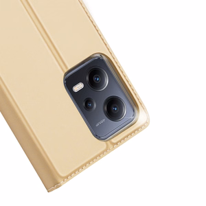 Dux Ducis Skin Pro dėklas Xiaomi Redmi Note 12 Pro / Poco X5 Pro 5G Flip kortelių piniginė stovas auksinė