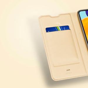 Dux Ducis Skin Pro knygos tipo dėklas Samsung Galaxy A03s auksinis