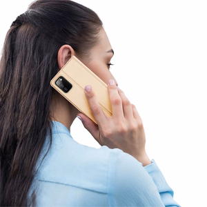 Dux Ducis Skin Pro knygos tipo dėklas Samsung Galaxy A03s auksinis
